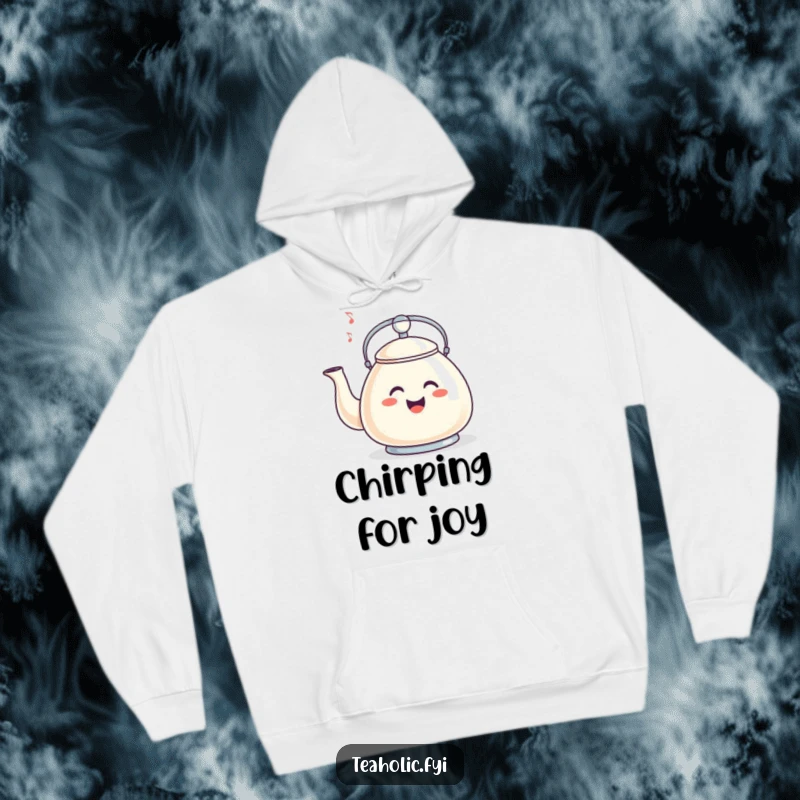 Funny hoodie featuring a smiling tea kettle whistling a happy tune, perfect for cozy, musical relaxation.
