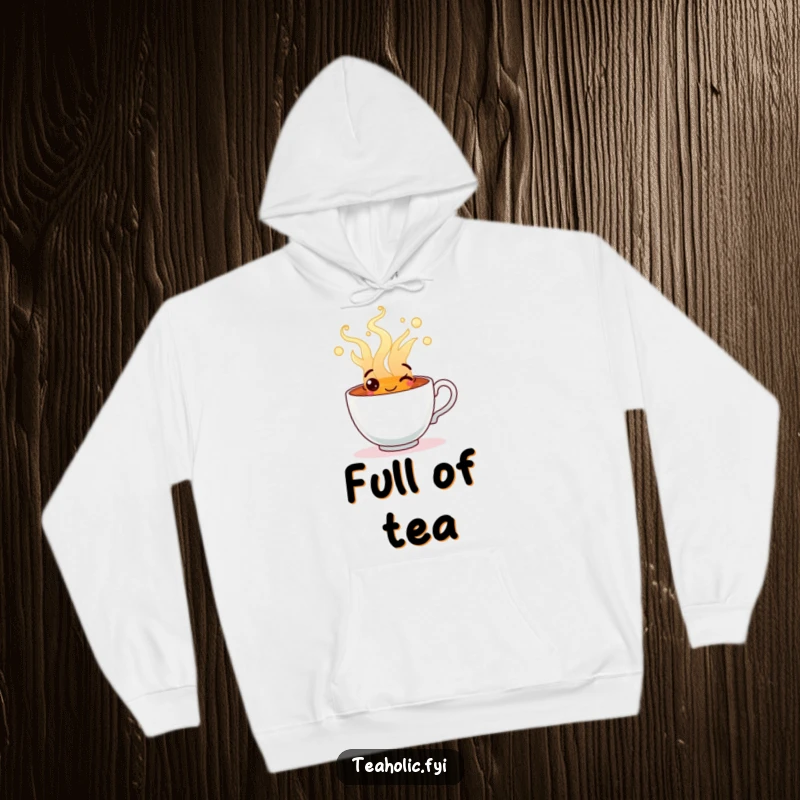 Funny hoodie depicting a happy tea cup character overflowing with steaming, cheerful tea, perfect for cozying up.