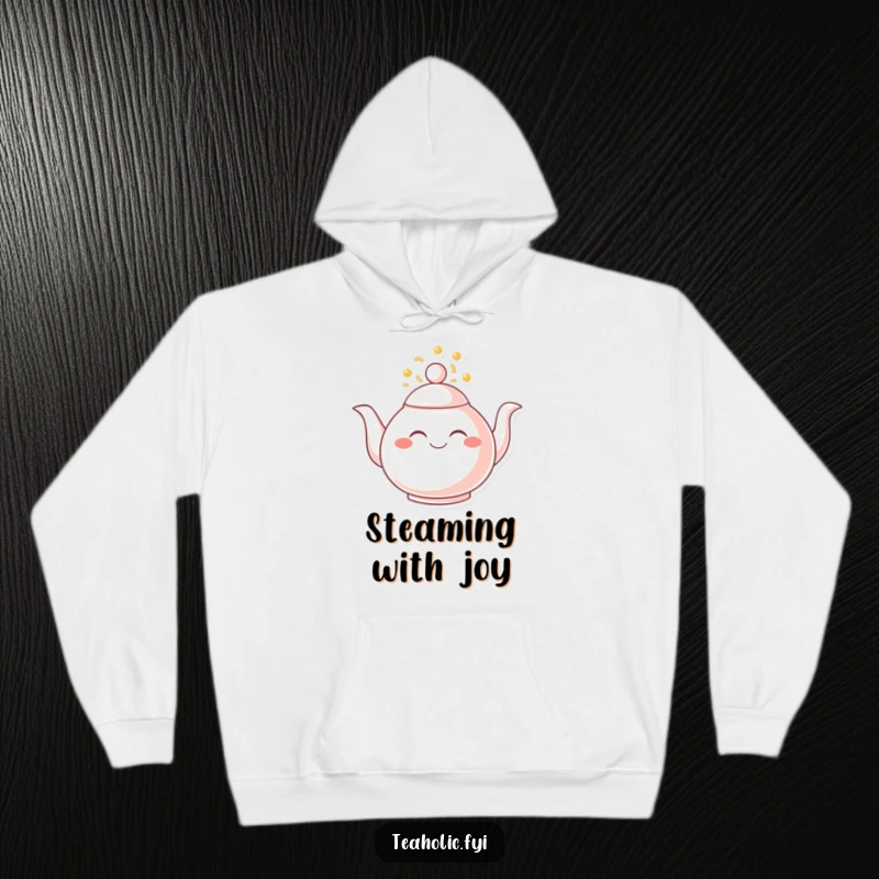 Funny hoodie featuring a smiling teapot with its spout overflowing with joy, offering warm comfort and cheerful vibes.