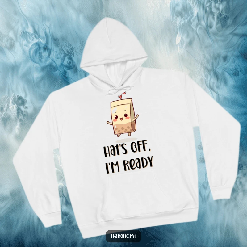 Funny Hoodie with a smiling tea bag character wearing a little hat, depicted in a dynamic bouncing pose, radiating happiness.