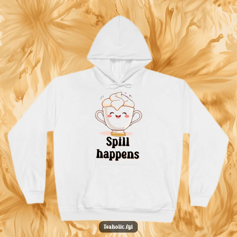 Funny hoodie with a gleeful teacup character smiling while spilling frothy tea, perfect for cozying up after spills.