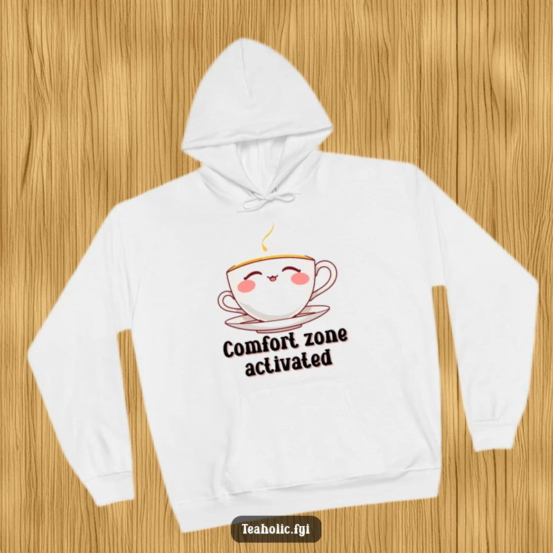 Funny thrilled teacup hoodie showcasing a character joyfully sipping tea with closed eyes, offering ultimate comfort and a humorous touch.