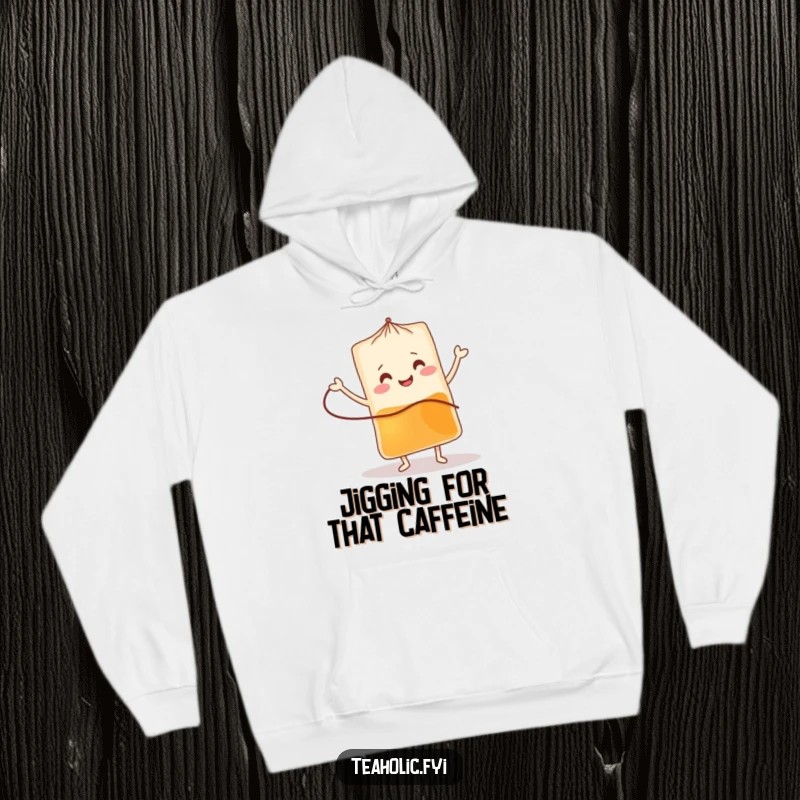Funny tea bag hoodie with a smiling character doing a cheerful jig, ideal for warmth and a funny gift.