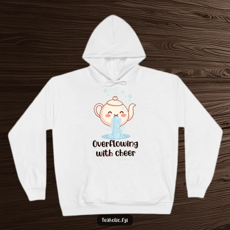 Funny hoodie with a teapot character joyfully pouring a massive cascade of effervescent bubbles, perfect for cozy days.