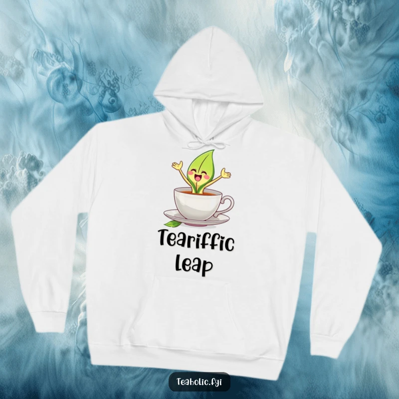 Funny hoodie depicting a joyful tea leaf character leaping with great enthusiasm from a teacup, offering cozy cheer.