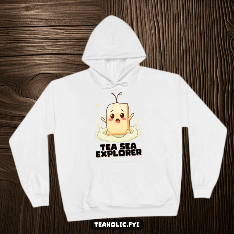 Funny surprised teabag character comically floating on a bubbly tea sea, featured on a warm, hooded sweatshirt.