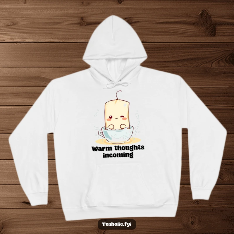 Funny hoodie featuring a joyful tea bag character having a wild splash party in a mug of hot water, perfect for cold days.