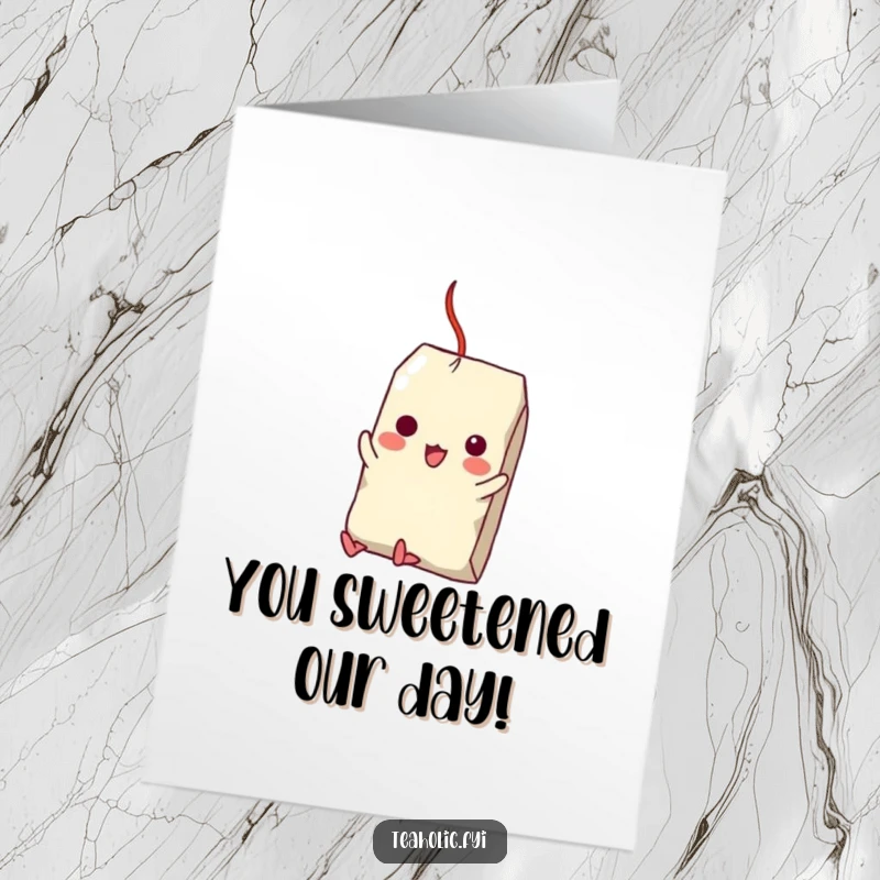 Funny Free Printable Congratulations Card: Tea bag character swings from sugar cube in a moment of sweet triumph, a downloadable gift.