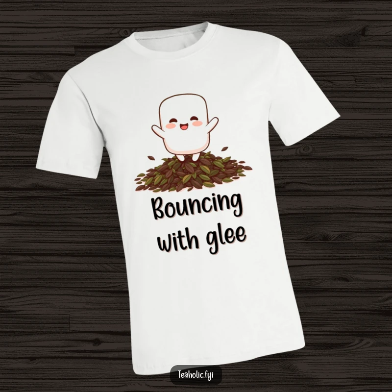 Funny giggling marshmallow character playfully bouncing on a pile of tea leaves, printed on a comfortable t-shirt.