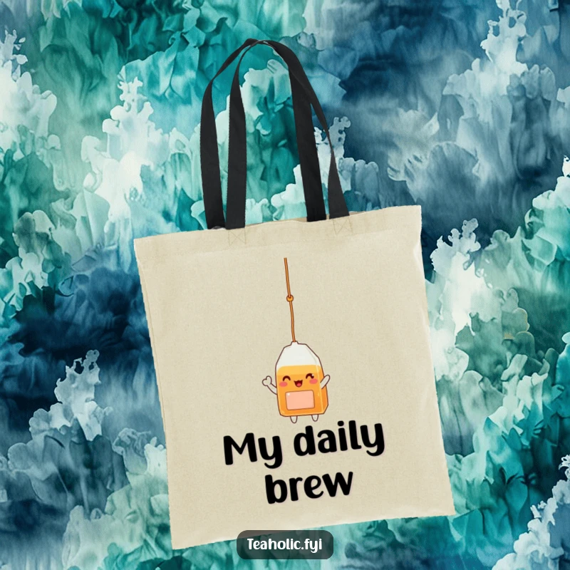 Funny tote bag with a delighted tea bag character dangling from its string and waving, ideal for cheerful shoppers.
